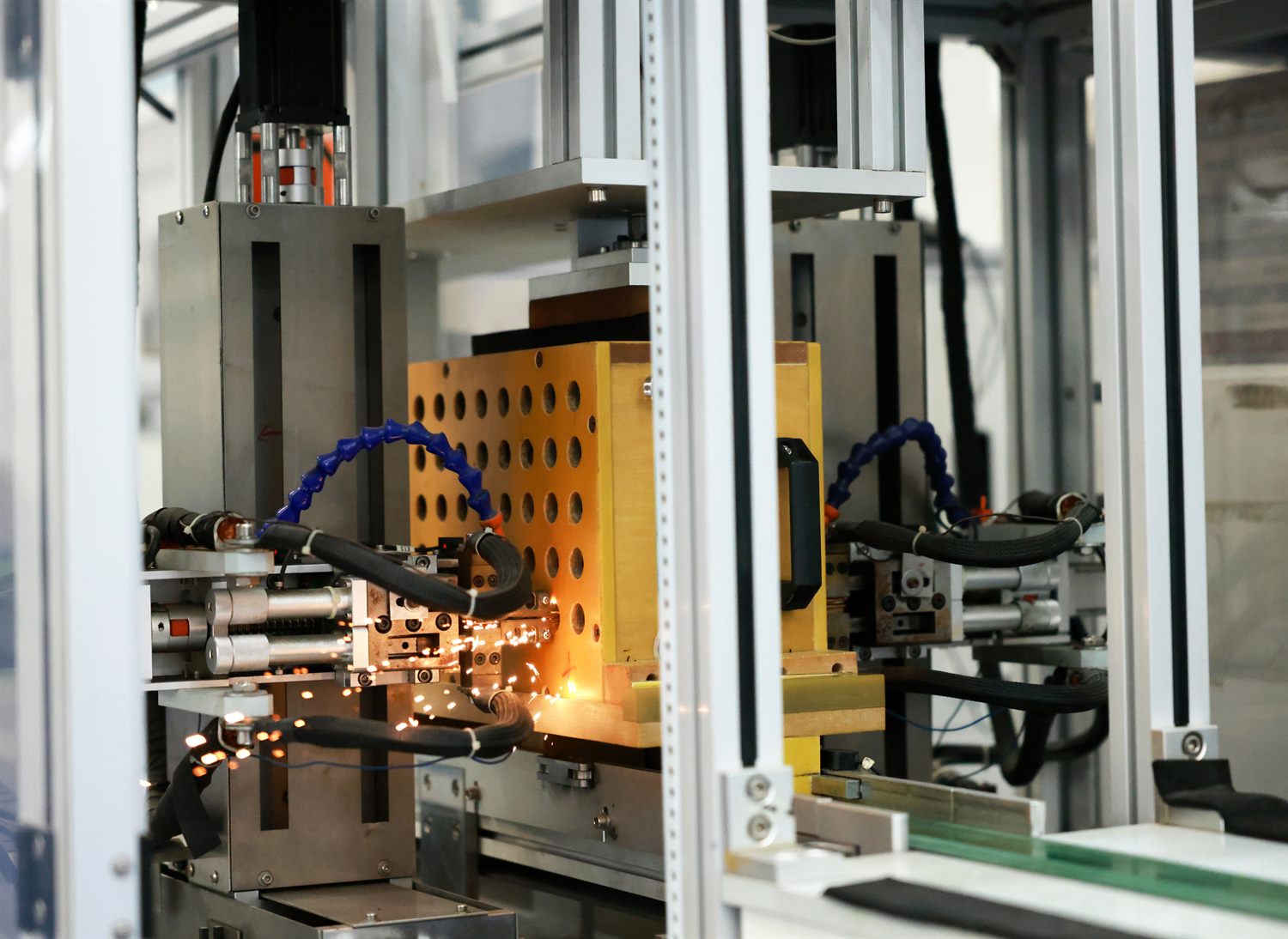 Busbar welding in progress with sparks